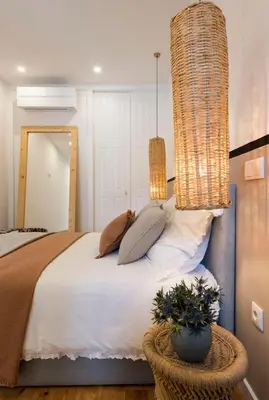 a bedroom with a large bed with two pillows at GuestReady - The Dukes Retreat E in Porto