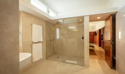 a bathroom with a shower and a bath tub at Ceuta Terrace Suites in Porto