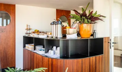a room with a counter with food on it at Ceuta Terrace Suites in Porto