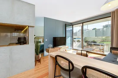 a hotel room with a bed and a window at Feel Porto Corporate Housing Campanhã in Porto
