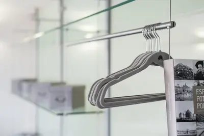 a hanger with a sign in front of a building at GuestReady - Subzero Design in Porto