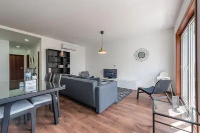 a living room with a couch and a table at GuestReady - Redamancy Flat in Porto