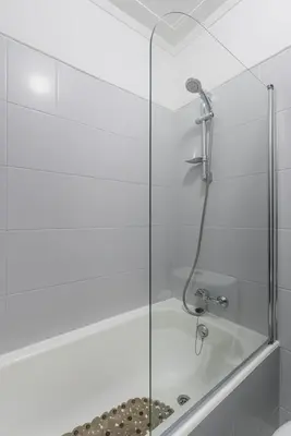 a shower with a glass door in a bathroom at GuestReady - Porto Fantastic View in Vila Nova de Gaia
