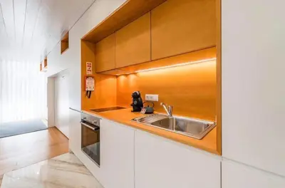 a kitchen with a sink and a counter top at Bright Studio in the Heart of Porto by Great&Cosy in Porto