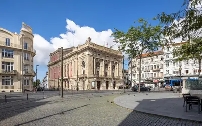 an old building on a street in a city at CASA JOY Cathedral apartment in Porto