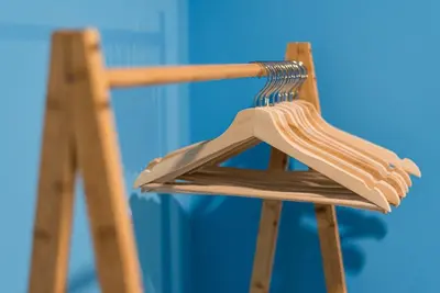 a wooden chair with a fork on top of it at GuestReady - Miragaia Historical Sight in Porto