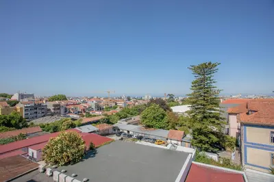 an overhead view of a city with a tree at Liiiving in Porto - City View Apartments in Porto