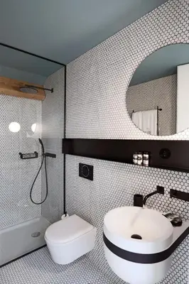 a bathroom with a sink and a toilet and a mirror at HM - Infante Riverside Apartment R in Porto