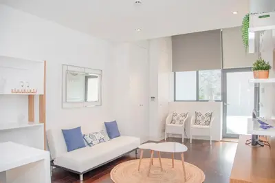 a living room with a couch and a table at Liiiving in Porto - Carlos Alberto Apartment in Porto