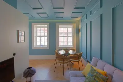 a living room with a couch and a table at HM - Infante Riverside Apartment M in Porto