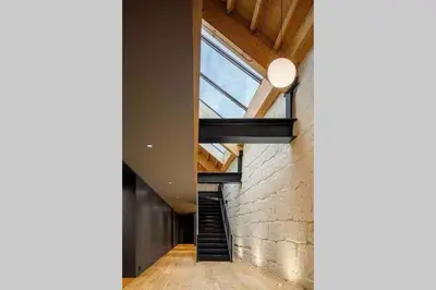 a staircase in a house with a window at BOUTIQUE Rentals-Art & Charm II Apt w/ Terrace in Porto