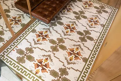 a rug on the floor of a room at Legends House by Sweet Porto in Porto