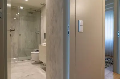 a bathroom with a shower and a toilet and a sink at Shiny Porto in Porto