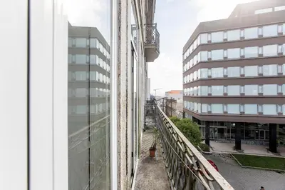 a view from the balcony of a building at Bonjardim Studio w/ Balcony by LovelyStay in Porto