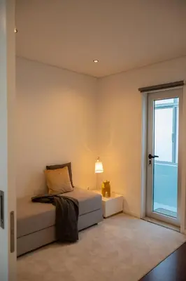 a bedroom with a bed and a window at North Star Flats @Santa Marinha in Vila Nova de Gaia
