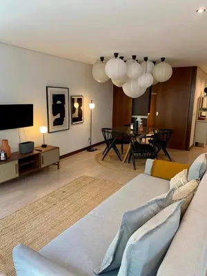 a living room with a couch and a table at Oporto Chic & Cozy - Oliveiras in Porto