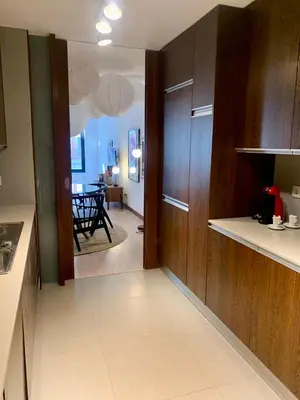 a kitchen with a hallway leading to a dining room at Oporto Chic & Cozy - Oliveiras in Porto