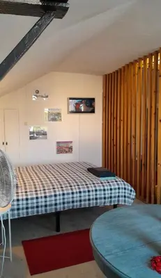 a bedroom with a bed in a room at Oporto Blue Liberdade - Central Studio with Amazing View and Kitchenette in Porto