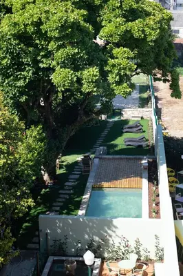 an overhead view of a swimming pool with trees at bnapartments Cedofeita in Porto