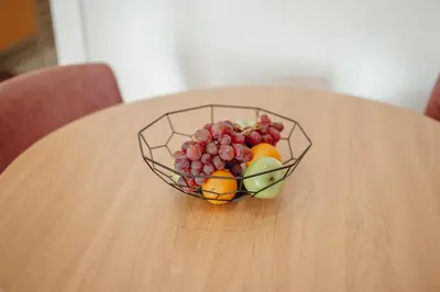 a bowl of fruit sitting on top of a table at River Eyes at Porto apartments in Porto