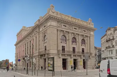 a large stone building on a city street at Luxury Prime Batalha Apartments in Porto