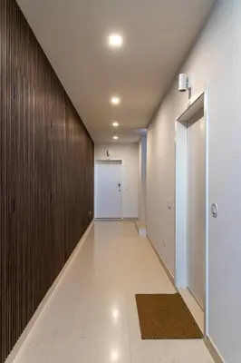 an empty hallway with a door and a hallway at Alvaro's Charming Loft by MP in Vila Nova de Gaia