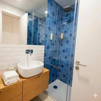 a bathroom with a sink and a shower at OportoCityView - Ceuta Aliados in Porto