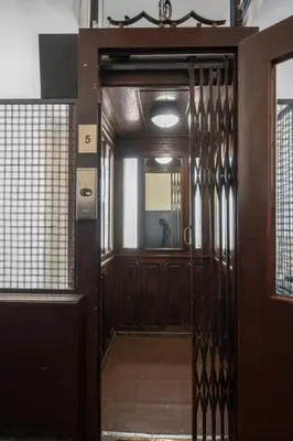 an entrance to a room with a wooden door at Blue Moon Studio in Porto