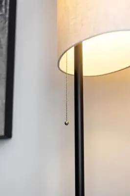 a close up of a lamp with a lampshade at Conceição Premium Downtown Apartment by DA'HOME in Porto