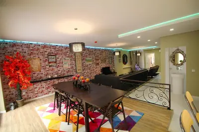 a living room with a table and a couch at HEART OF THE CITY ! in Porto