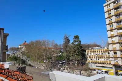 a view of a city with buildings and trees at HEART OF THE CITY 7 ! in Vila Nova de Gaia