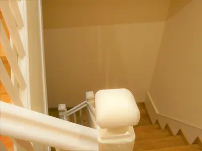 a bathroom with a toilet in a stair case at Porto Downtown Taipas in Porto