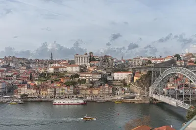 a view of a city with a bridge and a river at GuestReady - Port Studio 2 in Vila Nova de Gaia