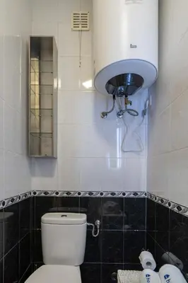 a bathroom with a toilet and a sink at Host Wise - Lovely & Cozy House - Prime Location in Vila Nova de Gaia
