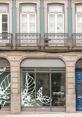 a store window with butterflies painted on it at Duque Oporto Apartment in Porto