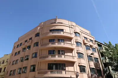 a tall building with balconies on the side of it at FLH Sá da Bandeira Modern Apartment in Porto