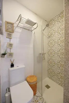a bathroom with a toilet and a shower at FLH Porto Ribeira Typical Studio in Porto
