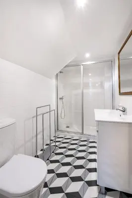 a bathroom with a shower and a toilet and a sink at VIVA Library Studio in Porto