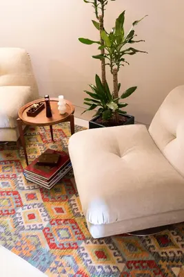 a living room with a table and chairs and a window at Jardins do Porto - by Unlock Hotels in Porto