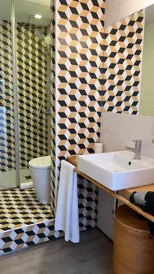 a bathroom with a sink and a shower at Porto Legend Apartments in Porto