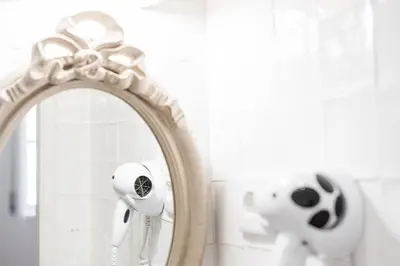 a mirror with a stuffed dog in front of it at GuestReady - Riber Porto Apts in Porto