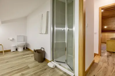 a glass shower in a bathroom with a toilet at D&S - Alegria 630 in Porto