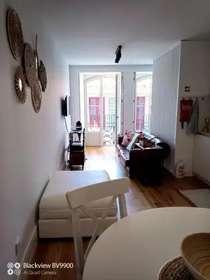 a living room with a couch and a table at Oporto Apartment Sé Catedral in Porto