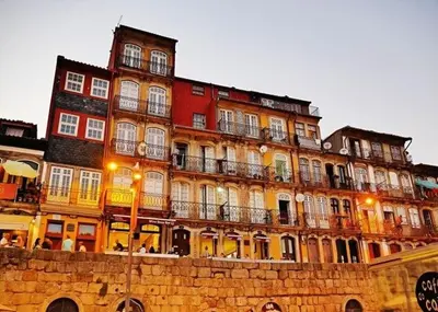 a large building with balconies on the side of it at OHH - General da Silveira Flat Deluxe Apartment - Downtown in Porto