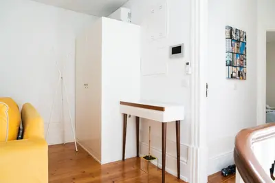 a living room with a couch and a table at Belleville in Porto