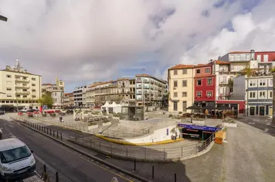 a view of a city with buildings and a street at Feel Porto Antique Poveiros Flats in Porto
