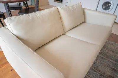 a white leather couch in a living room at Fancy Ribeira Porto in Porto