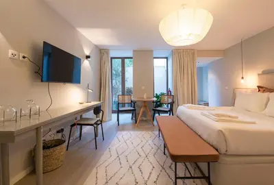 a dining room with a table and two chairs at Porto Central Loft I with Terrace in Porto