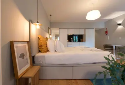 a bathroom with a sink and a toilet and a shower at Porto Central Loft II in Porto