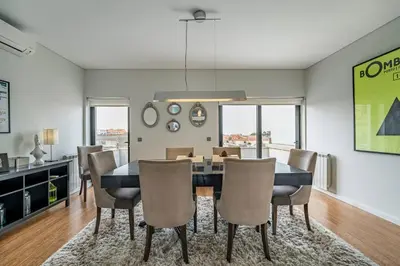 a kitchen with a sink and a counter top at Art City Villa in Porto